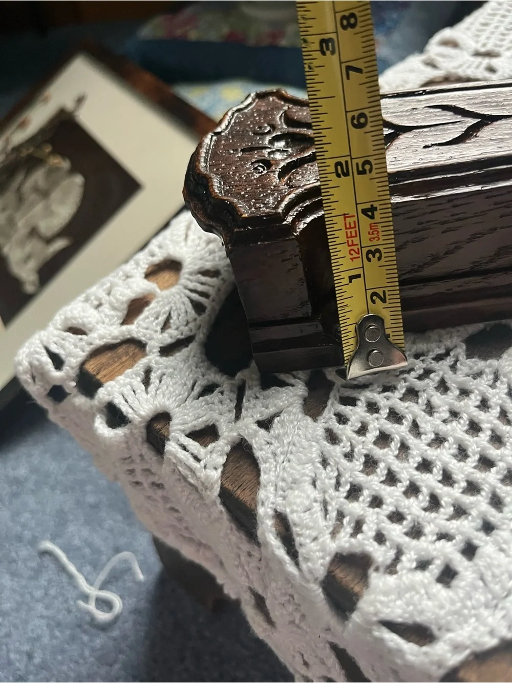 Carved Dark Wood Wall Pocket Vase will include a sprig of greenery
